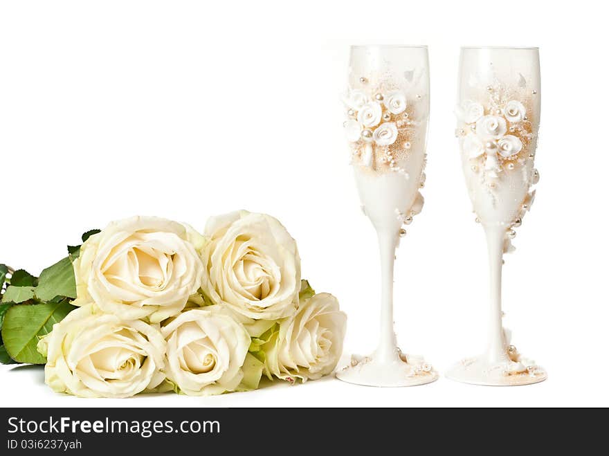 Two empty glasses with roses on white background. Two empty glasses with roses on white background