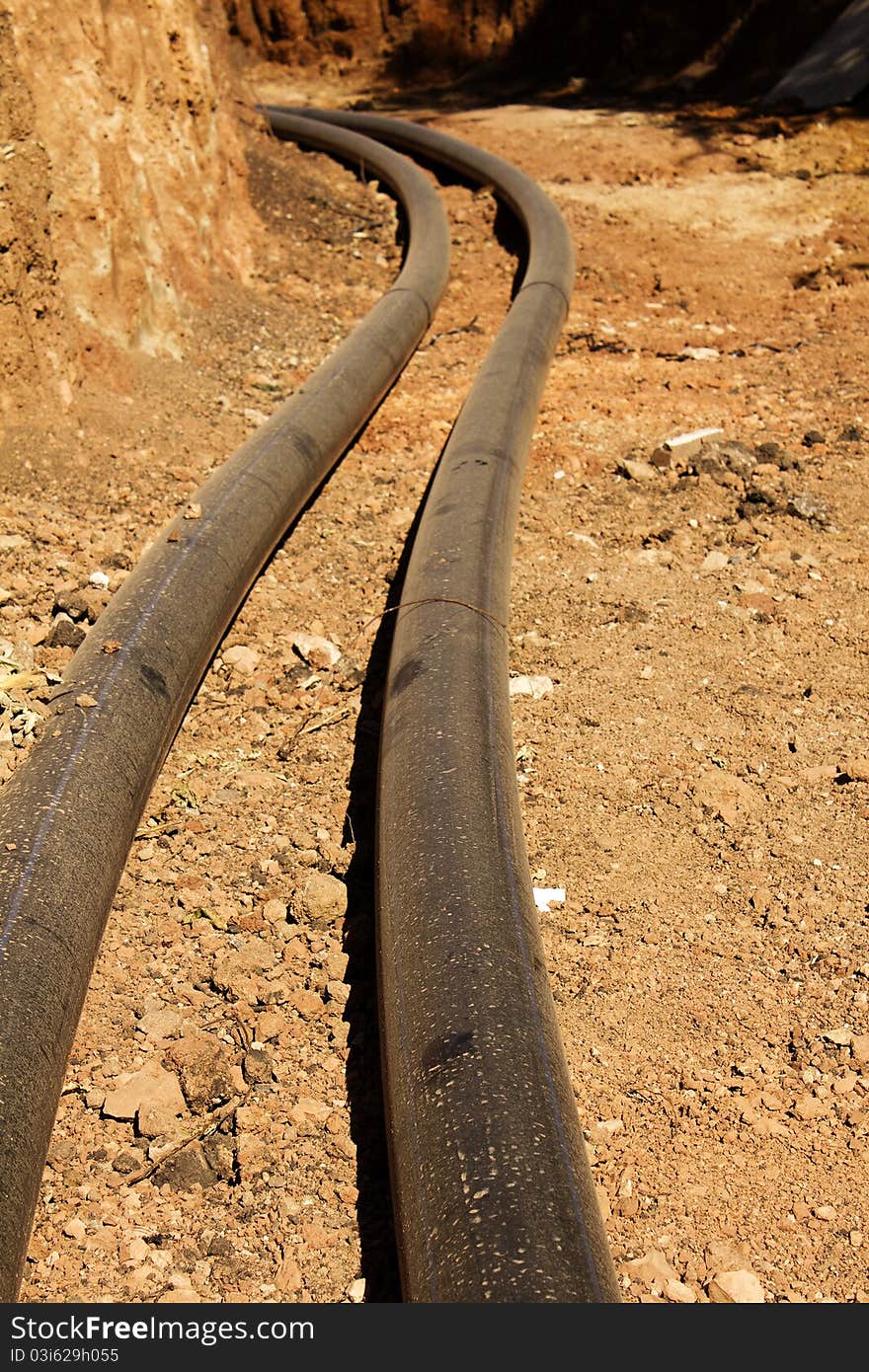 Pipes plastic pipeline new in the construction process in a trench