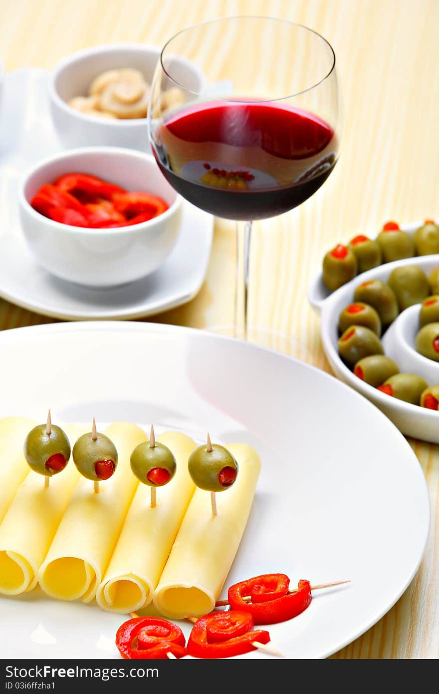 Cheese with stuffed green olives and red pepper. Cheese with stuffed green olives and red pepper