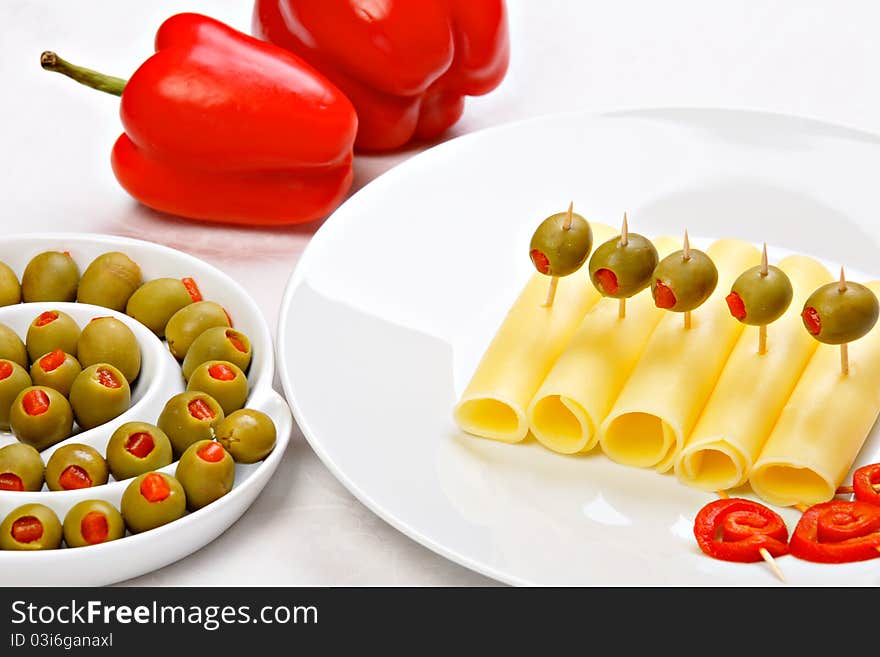 Cheese with stuffed green olives and red pepper. Cheese with stuffed green olives and red pepper