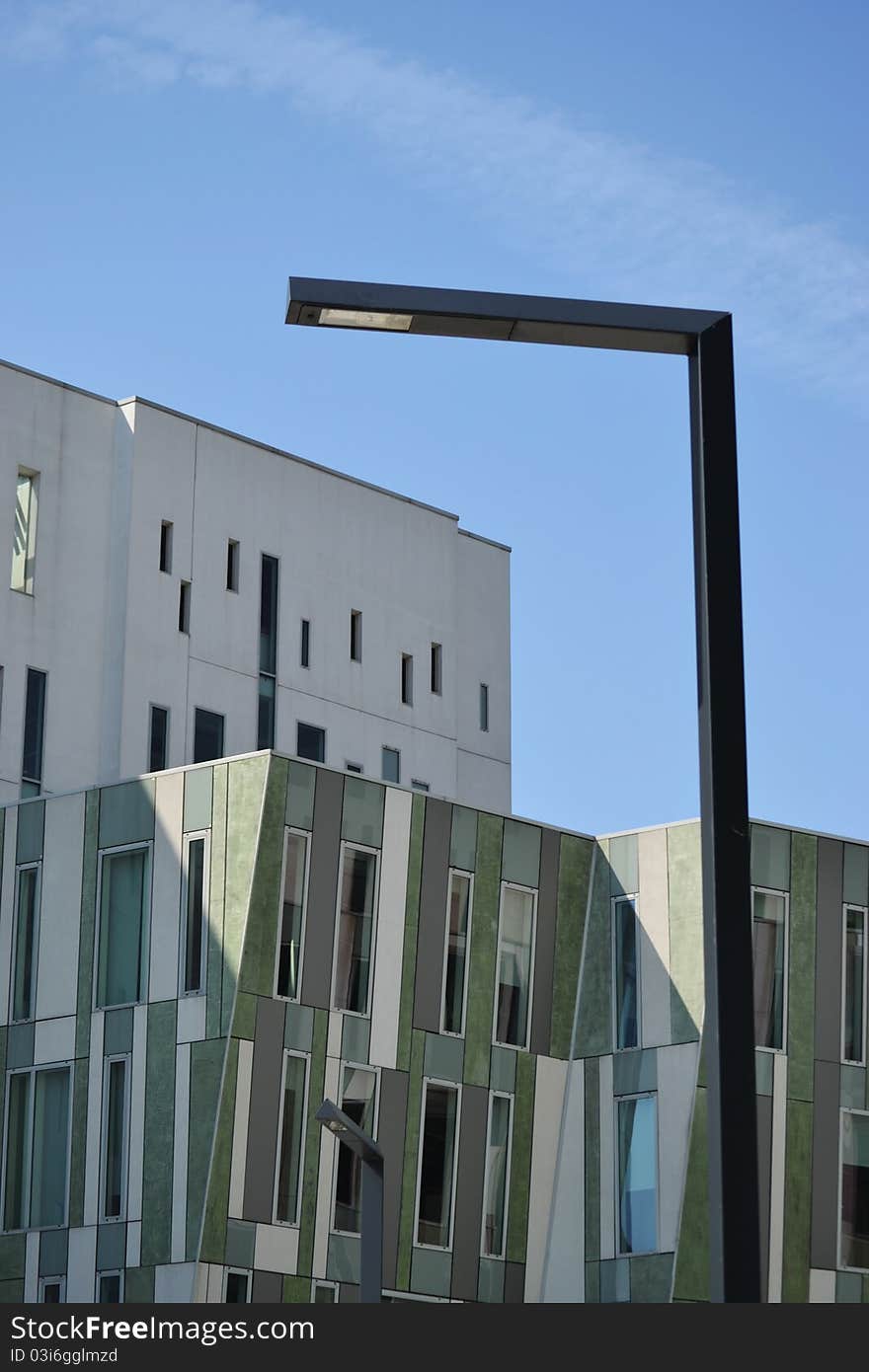 Modern building with street lamps