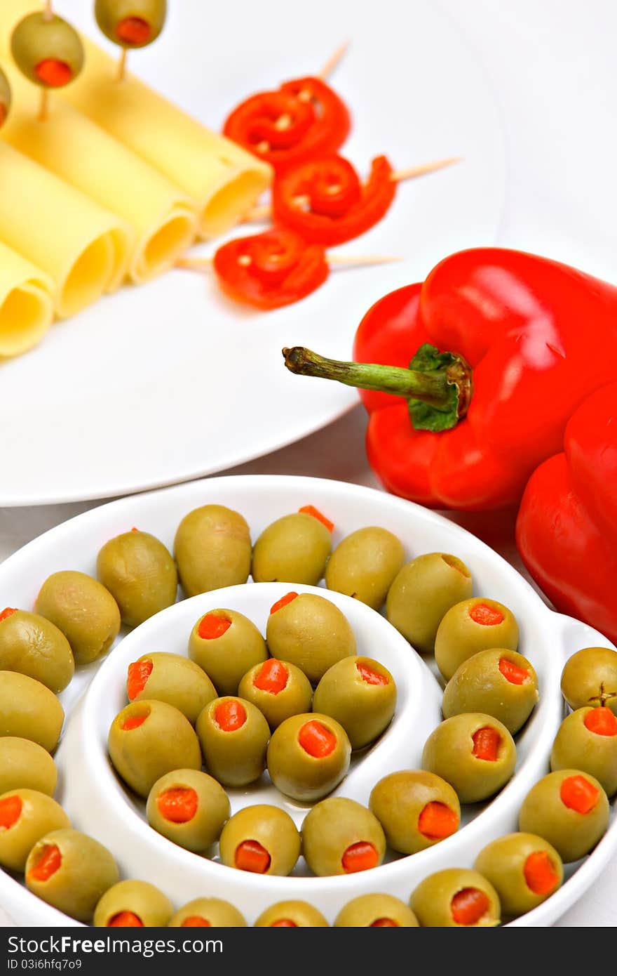 Cheese with stuffed green olives and red pepper. Cheese with stuffed green olives and red pepper