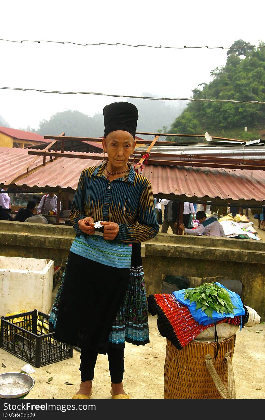 This elderly woman came to market in the region Sa Linh Mai Chau in northern Vietnam. She sold her vegetables. This elderly woman came to market in the region Sa Linh Mai Chau in northern Vietnam. She sold her vegetables