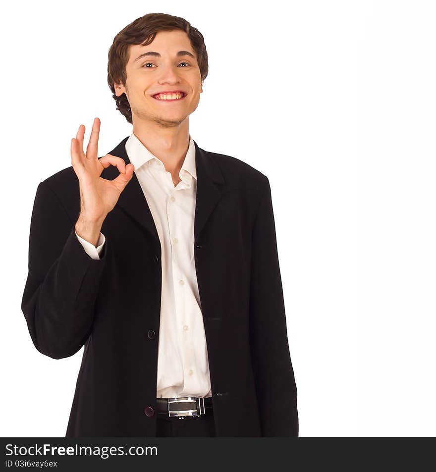 Young business man standing smiling and showing okay gesture on white background. Young business man standing smiling and showing okay gesture on white background