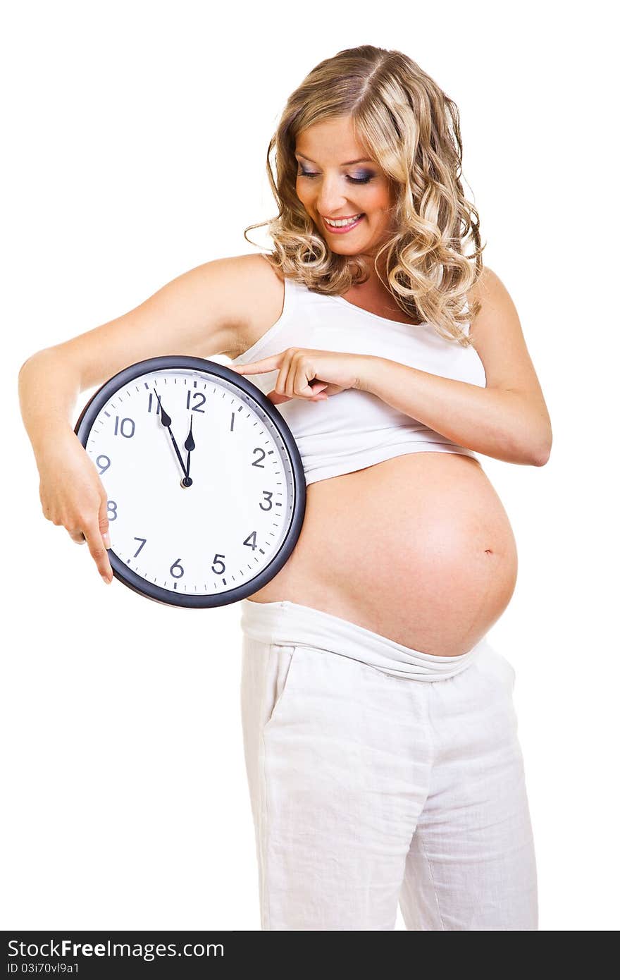 Pregnant woman with clock