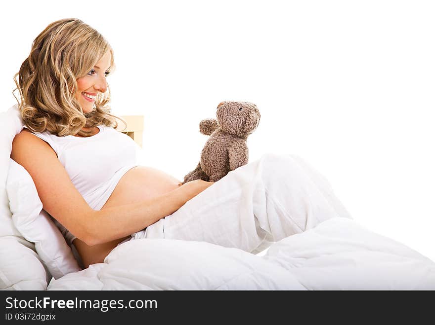 Pregnant woman in bed