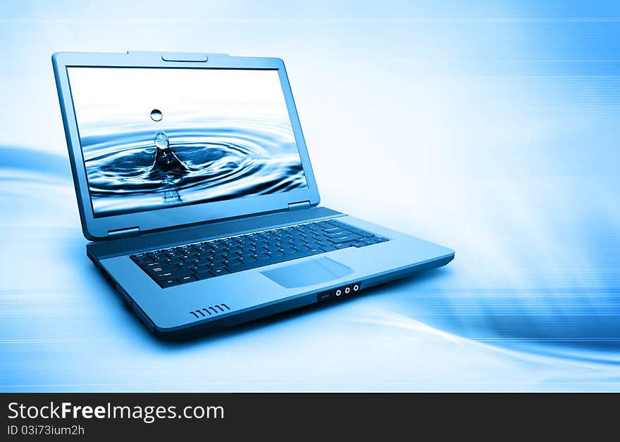 Black shiny laptop on abstract background. Black shiny laptop on abstract background