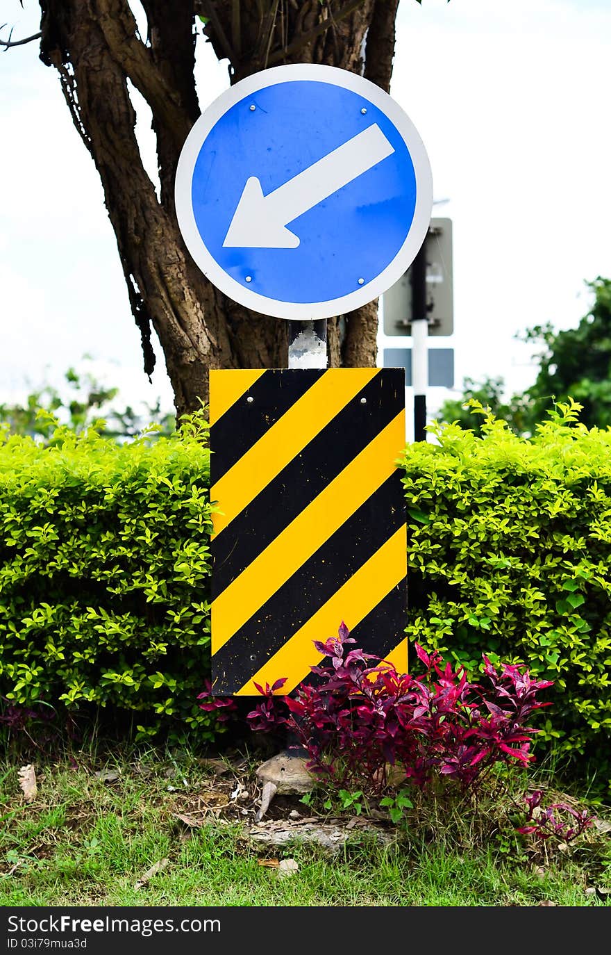 Road Sign White Arrow On Blue