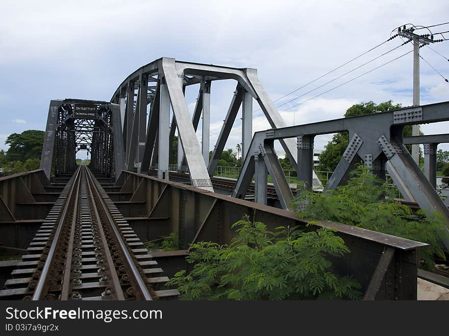 Railway on the bridge over the River Nakornchaisri Thailand. Railway on the bridge over the River Nakornchaisri Thailand