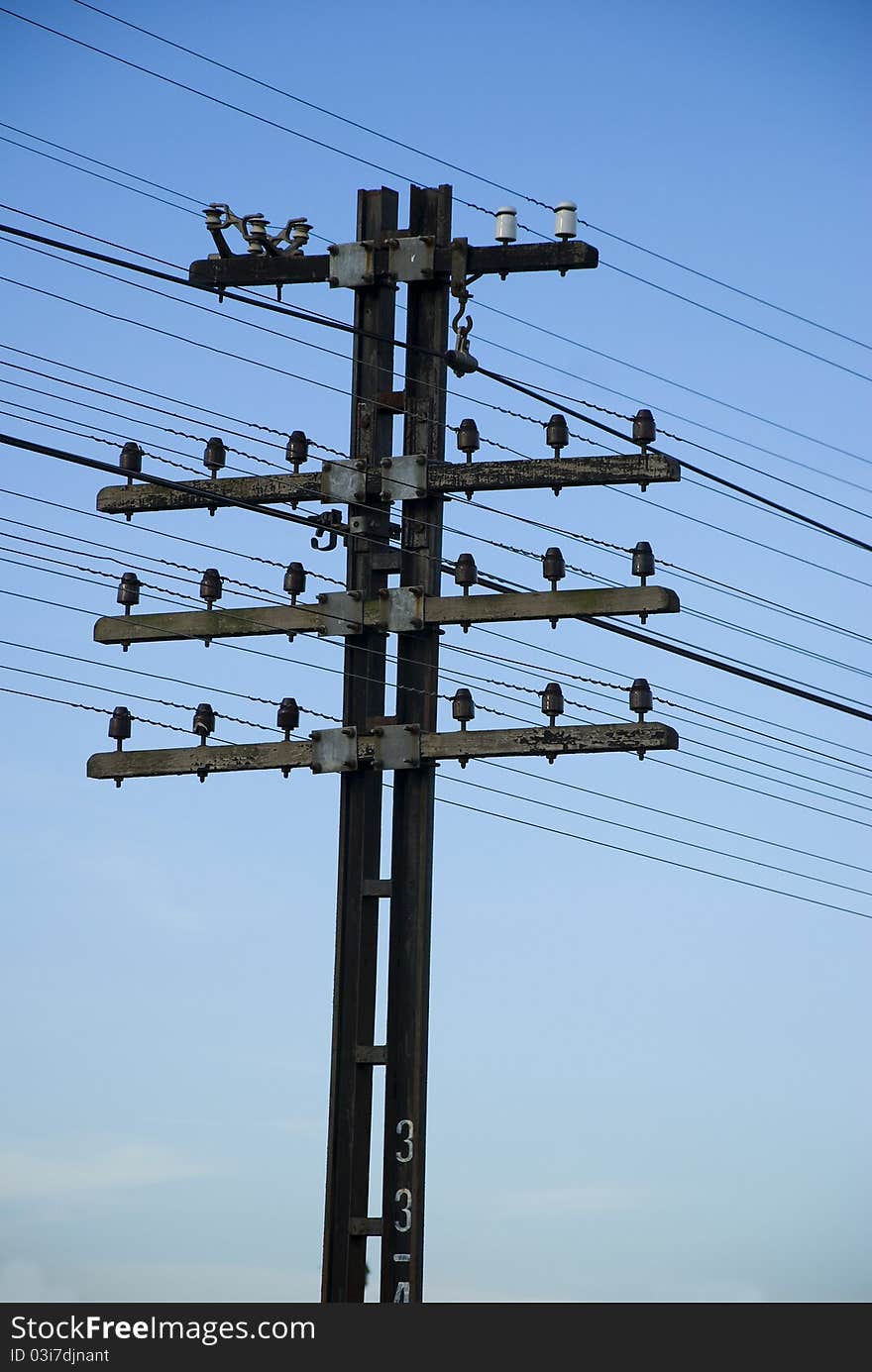 Electricity post in the sunrise