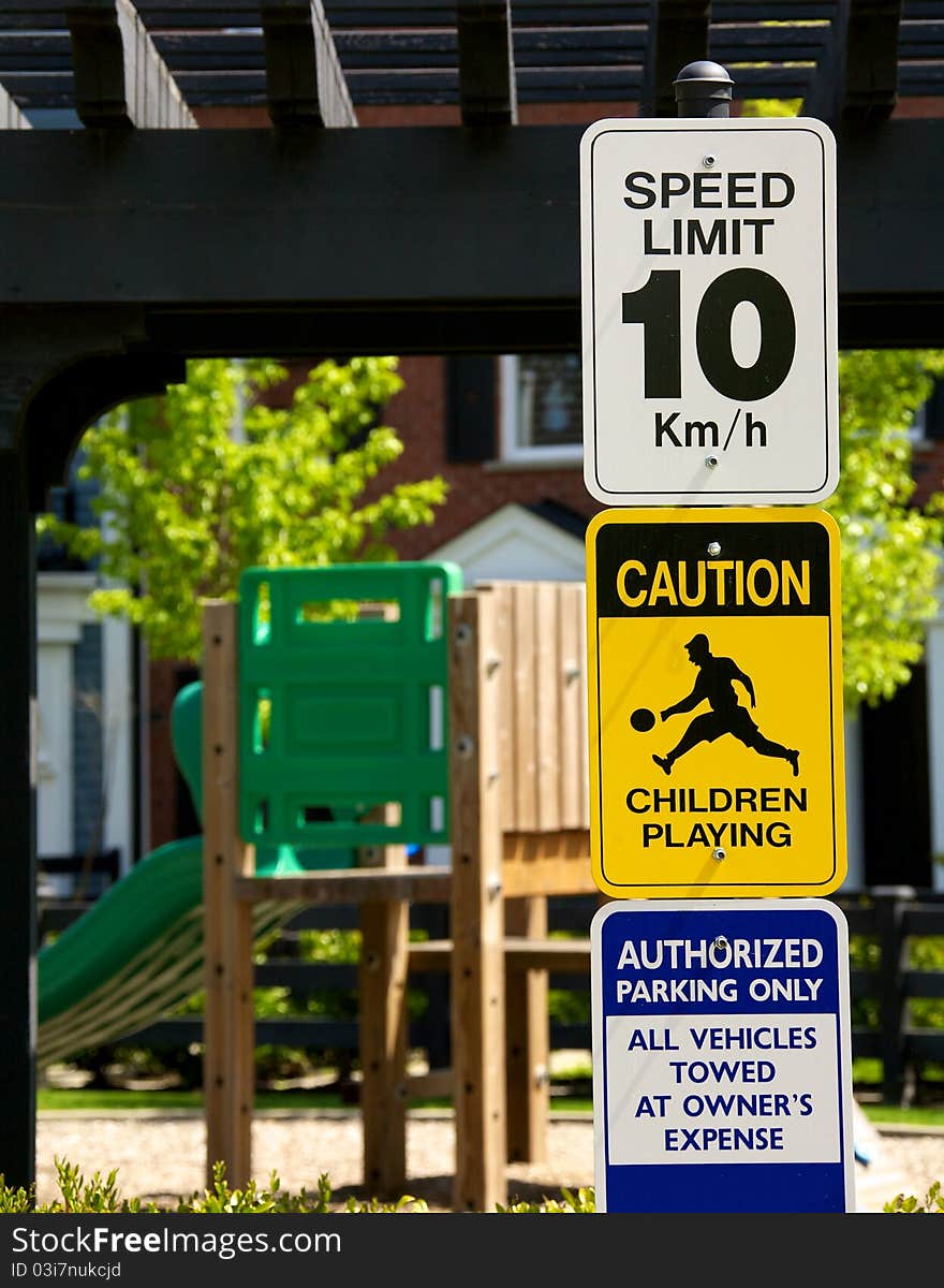 A warning sign outside of a park. A warning sign outside of a park