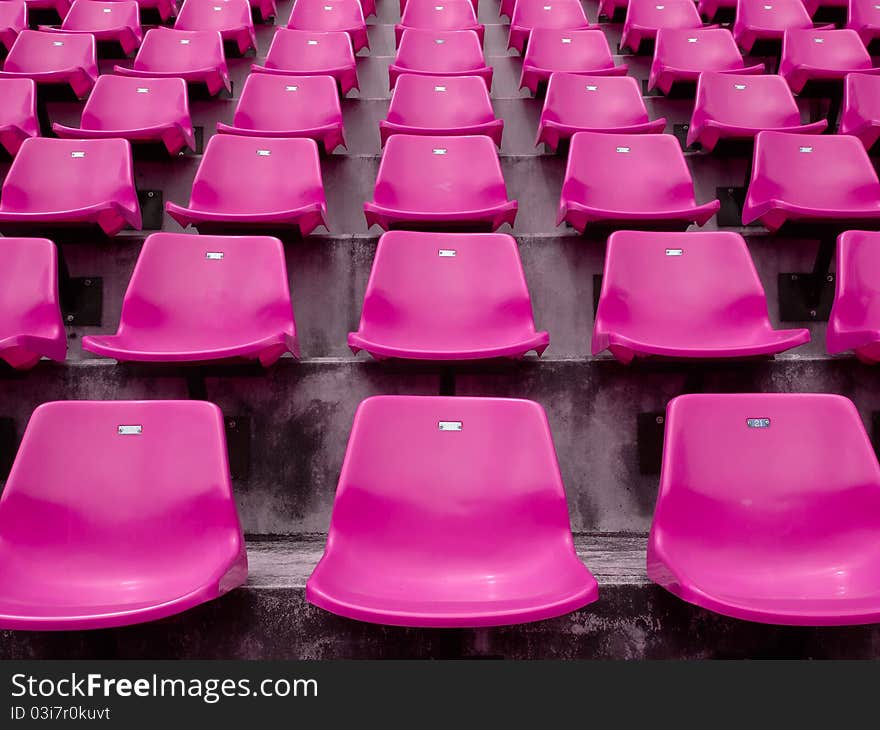 Pink seats on the stadium