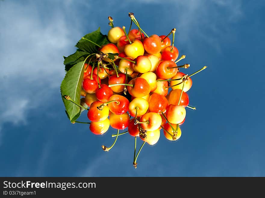 Cherries Under Clouds