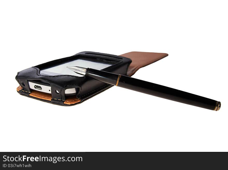 Mobile phone in a leather pouch with the fountain pen lying on a white table. Mobile phone in a leather pouch with the fountain pen lying on a white table.