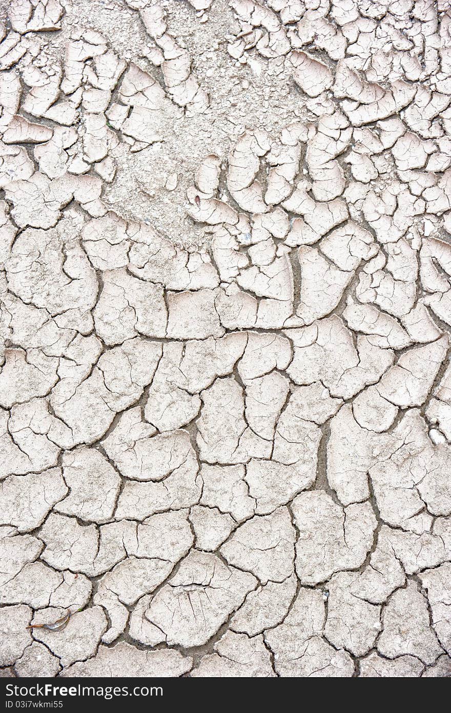 Arid, cracked earth due to lack of water. Arid, cracked earth due to lack of water