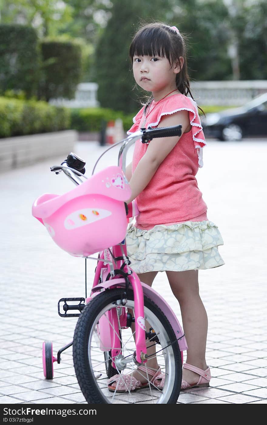 Asian child Riding a bicycle