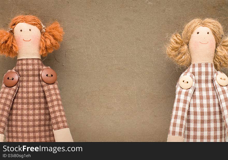 Vintage paper background with handmade toy. Vintage paper background with handmade toy