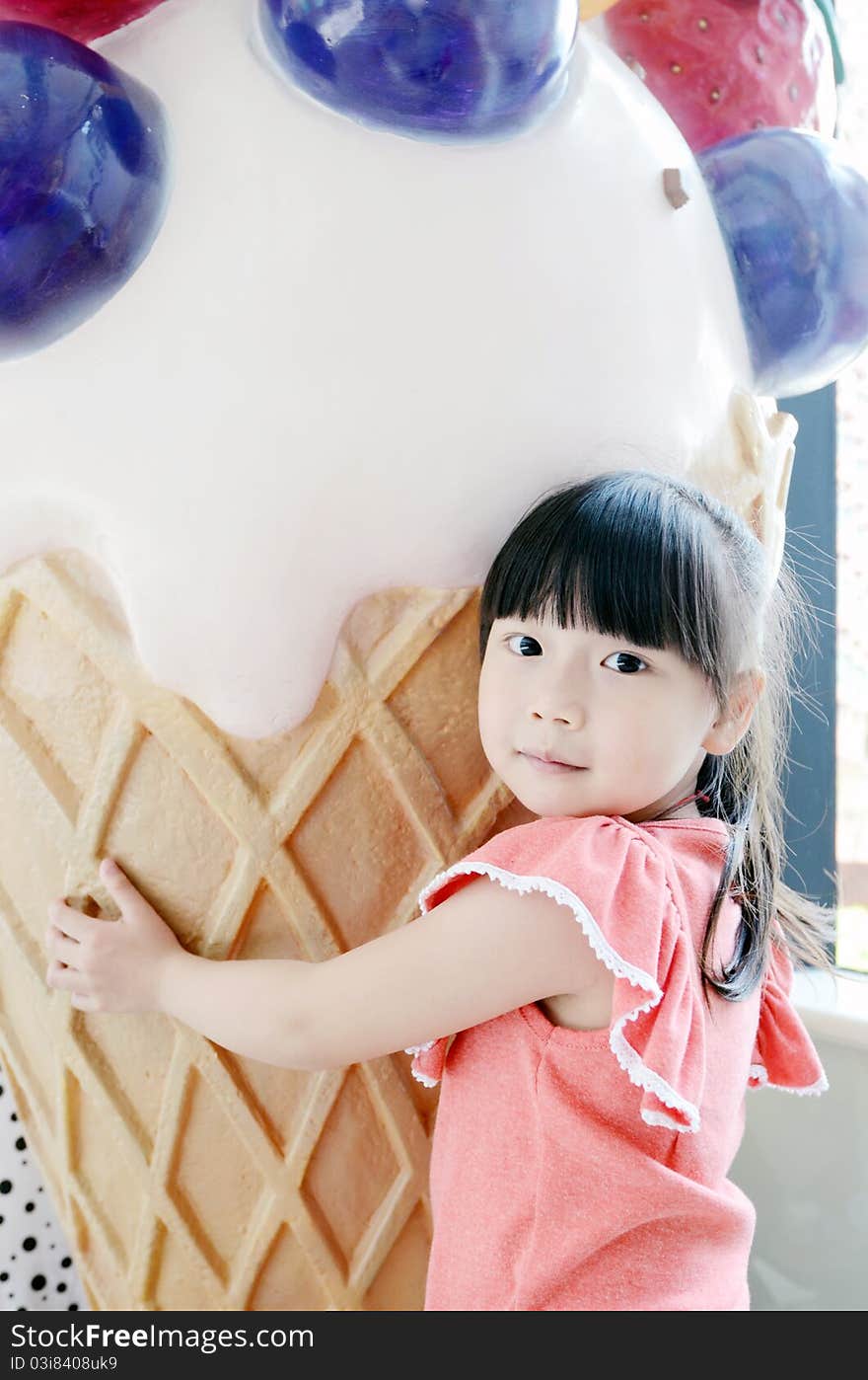 Bright picture of adorable chinese girl and ice cream. Bright picture of adorable chinese girl and ice cream