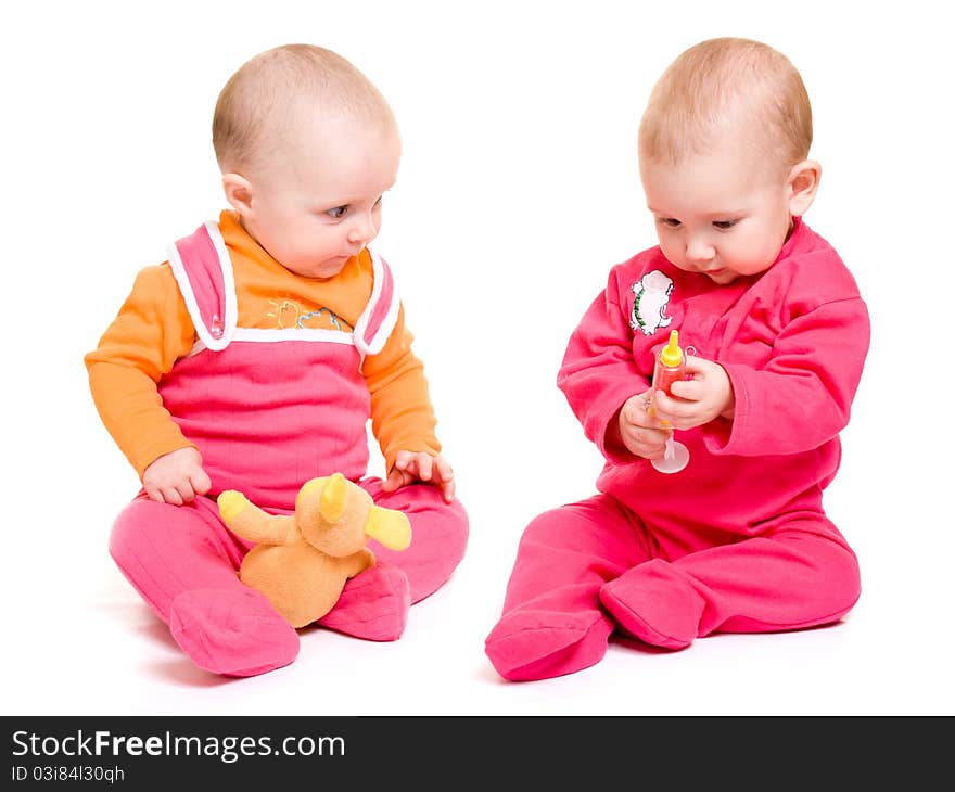 Two baby on a white background.