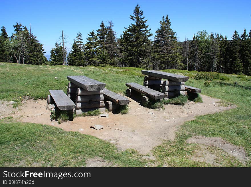 Open air picnic table on the beautiful summer day.