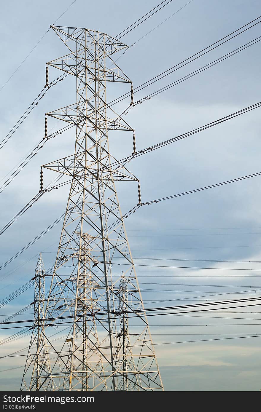 High voltage electricity pillars and blue sky