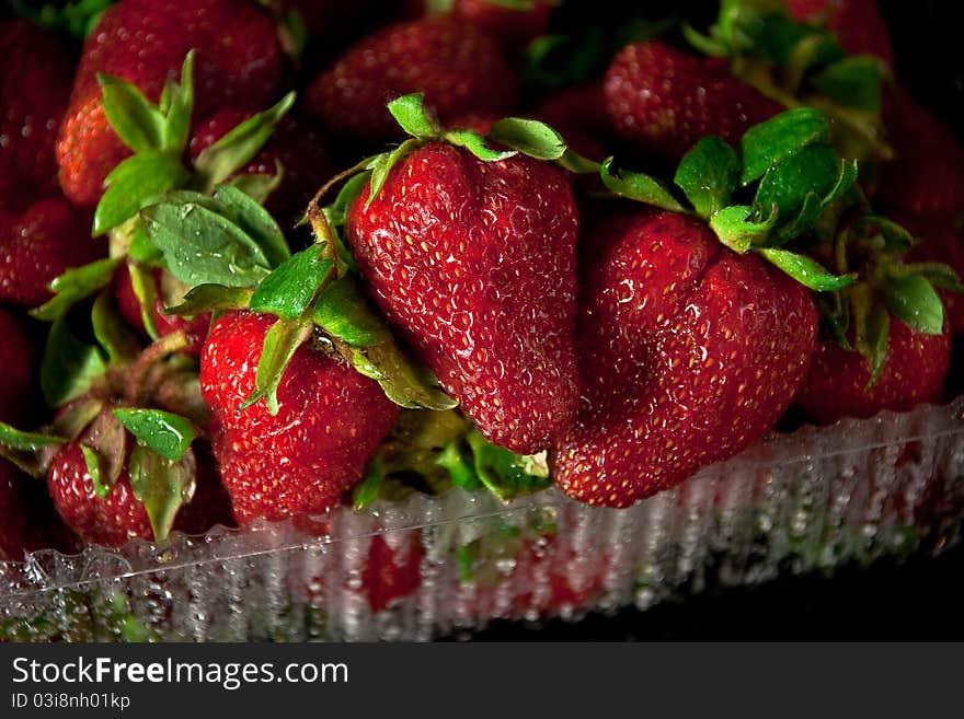 Fresh red strawberrys on black. Fresh red strawberrys on black