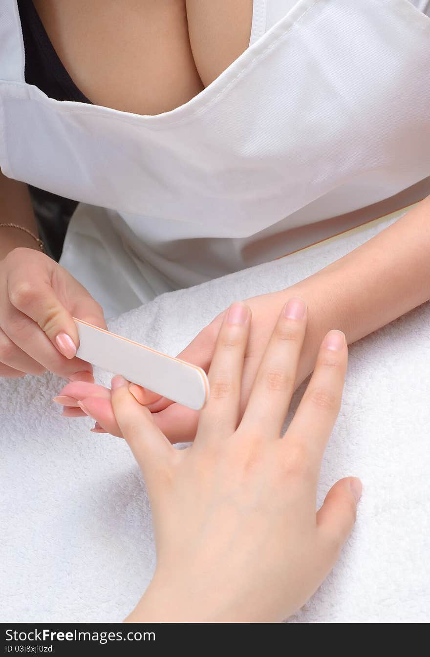 Procedure of making manicure using nailfile. Procedure of making manicure using nailfile