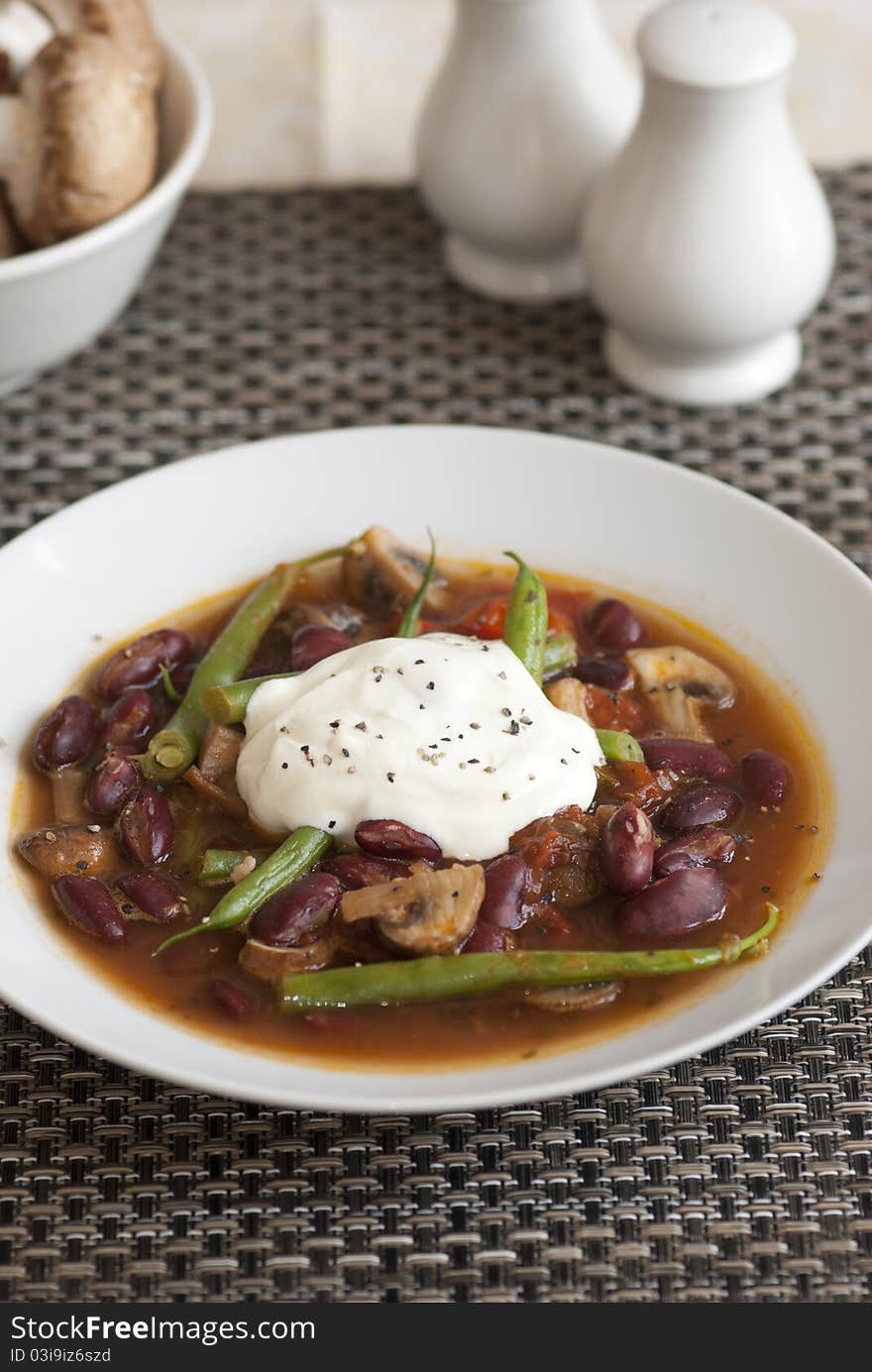 Vegetable chilli with green beans and creme fraiche