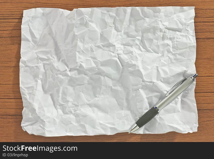 Crumpled Blank Paper With Pen