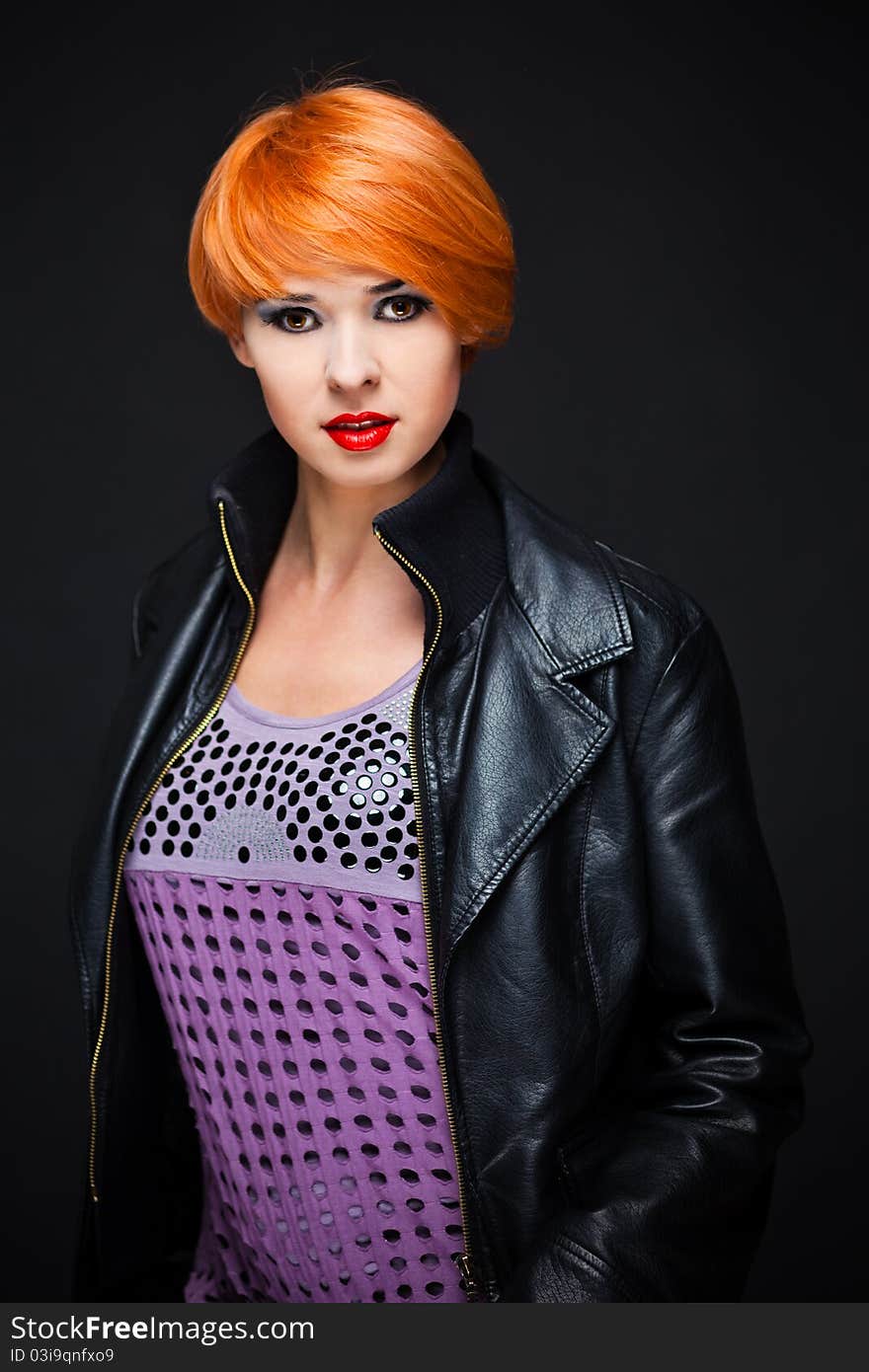 Redhead Woman black leather jacket. Redhead Woman black leather jacket