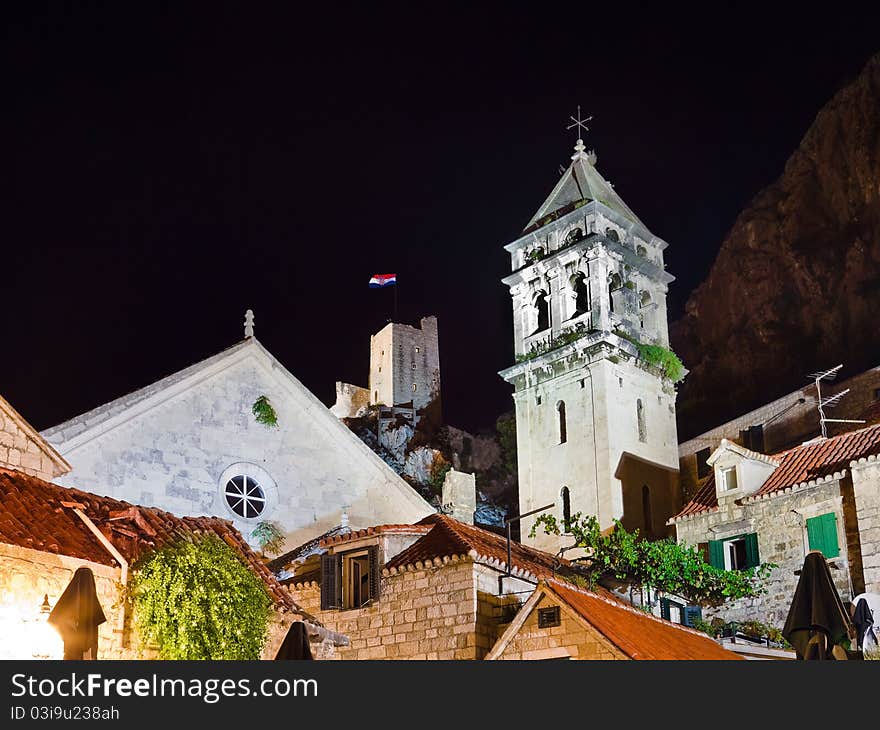 Old fort in Omis, Croatia at night - architecture background