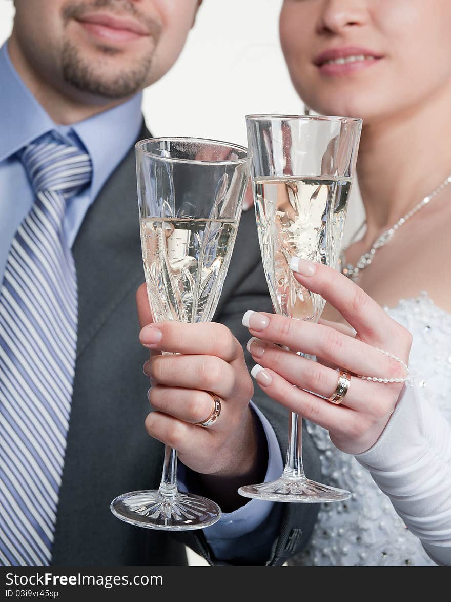 Happy bride and groom toasting with champagne. Happy bride and groom toasting with champagne