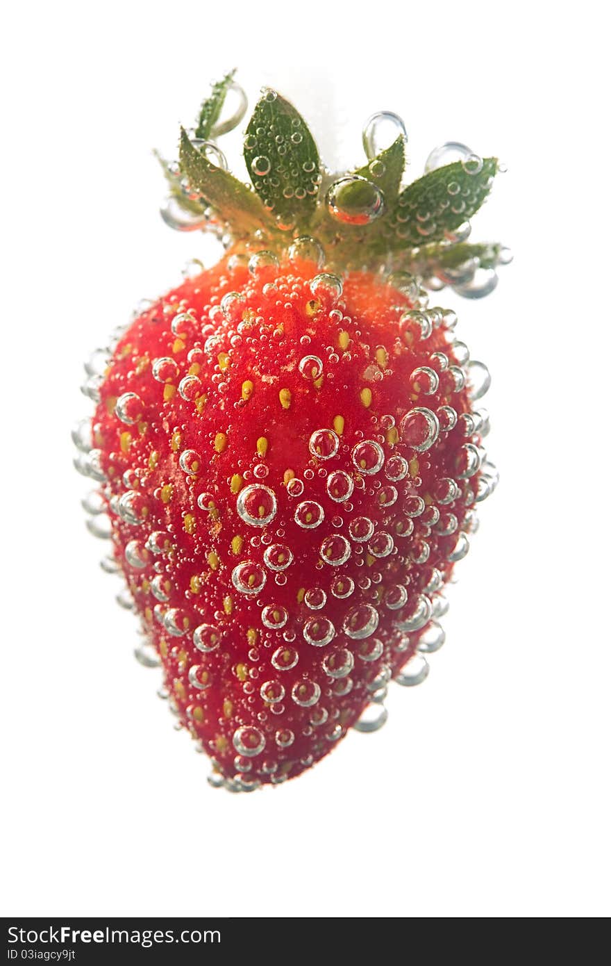 Strawberrie in water bubble over white background