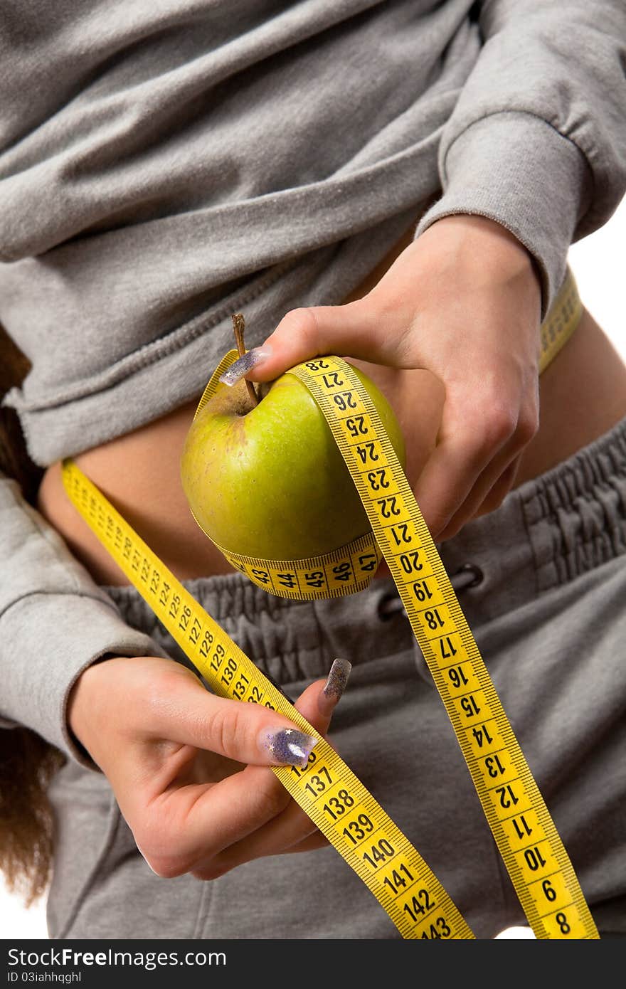 Woman Holding An Apple With Measuring