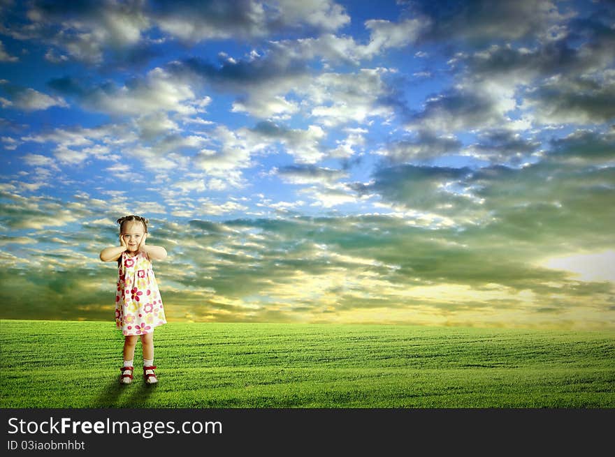 The child playing in the field