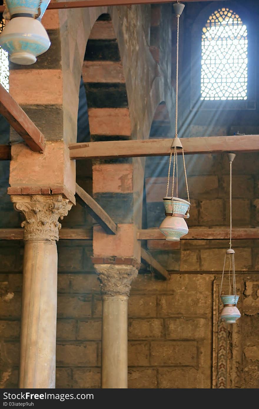 Egyptian interior, stained-glass windows and lamps with the Arabic script