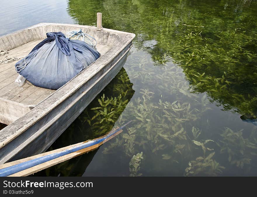 Old boat, underwater green plants very clear and beautiful scene. Old boat, underwater green plants very clear and beautiful scene