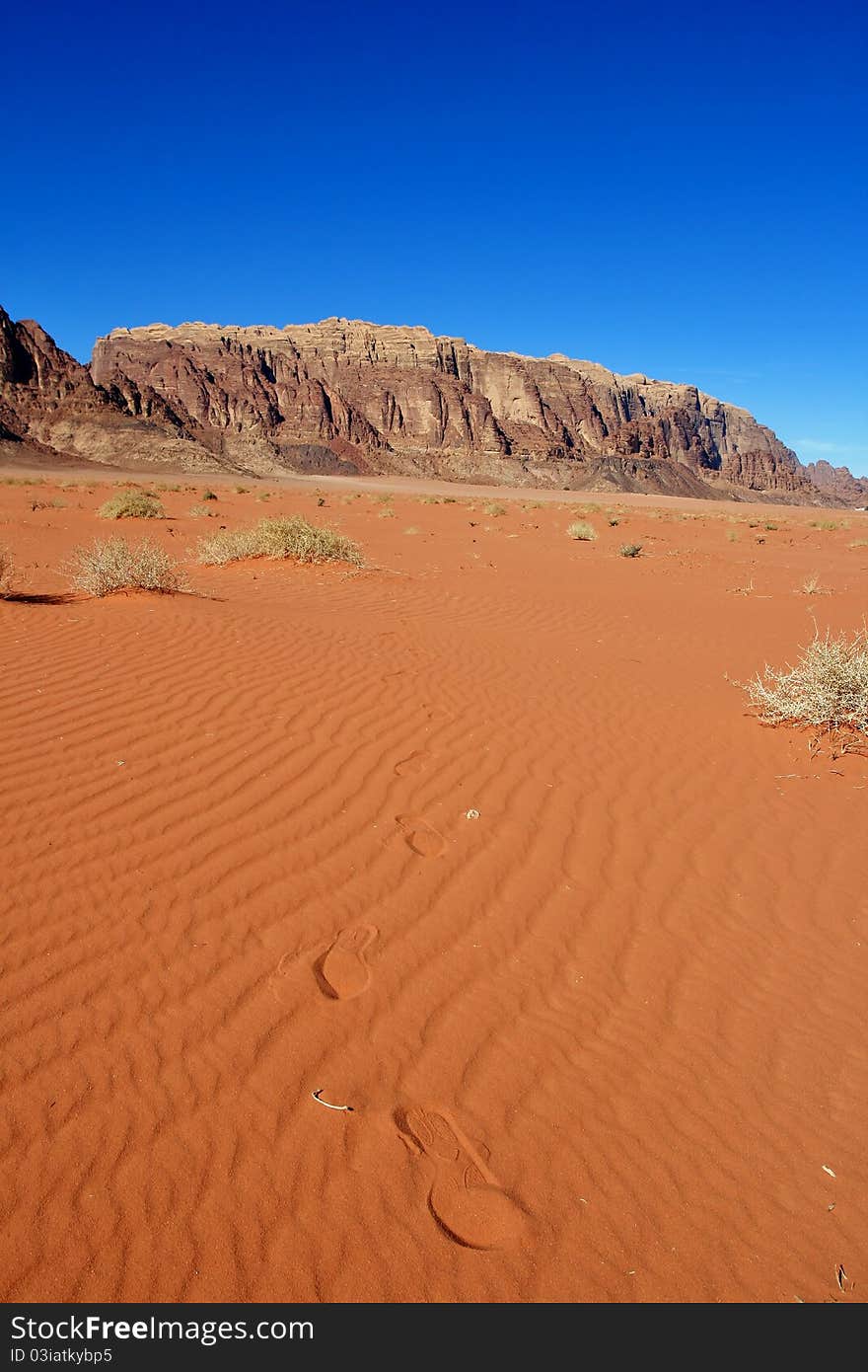 Footprints in the red desert in Jordan