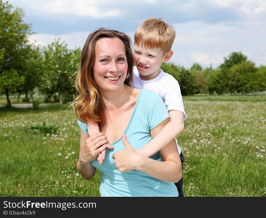 Mother with her son outdoors