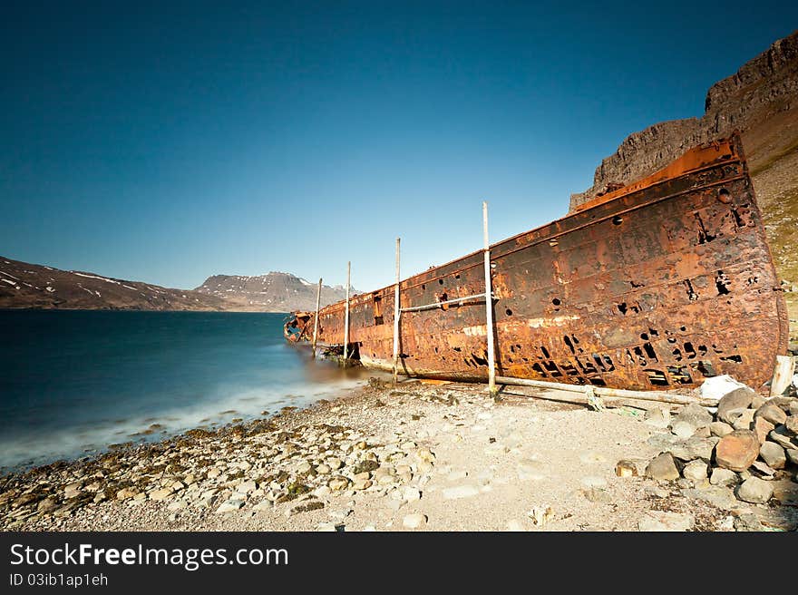 Seascape picture taken in west part of iceland with old rusted standed ship. Seascape picture taken in west part of iceland with old rusted standed ship