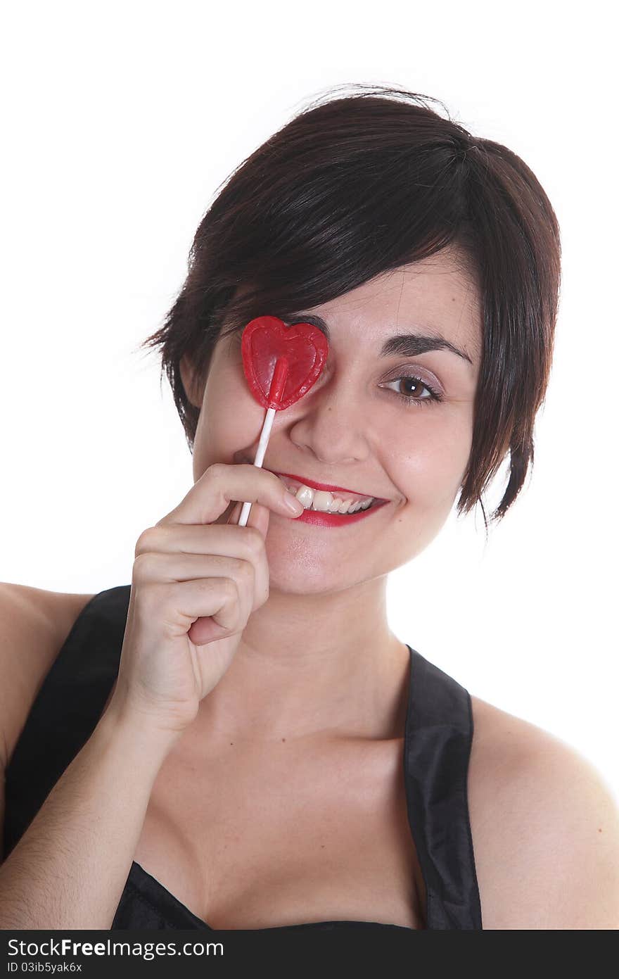 Girls with heart red lollipop in her hand. Girls with heart red lollipop in her hand