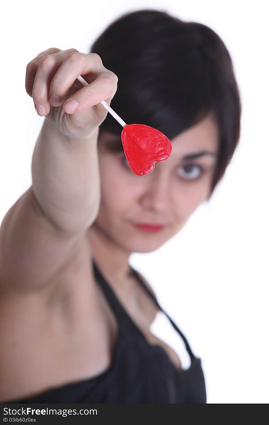 Girls with heart red lollipop in her hand. Girls with heart red lollipop in her hand