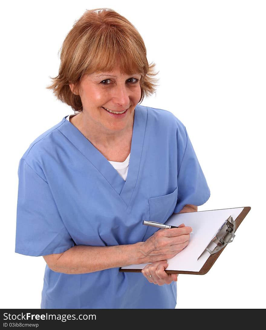 Nurse Looking Up With Clipboard In Hand. Nurse Looking Up With Clipboard In Hand