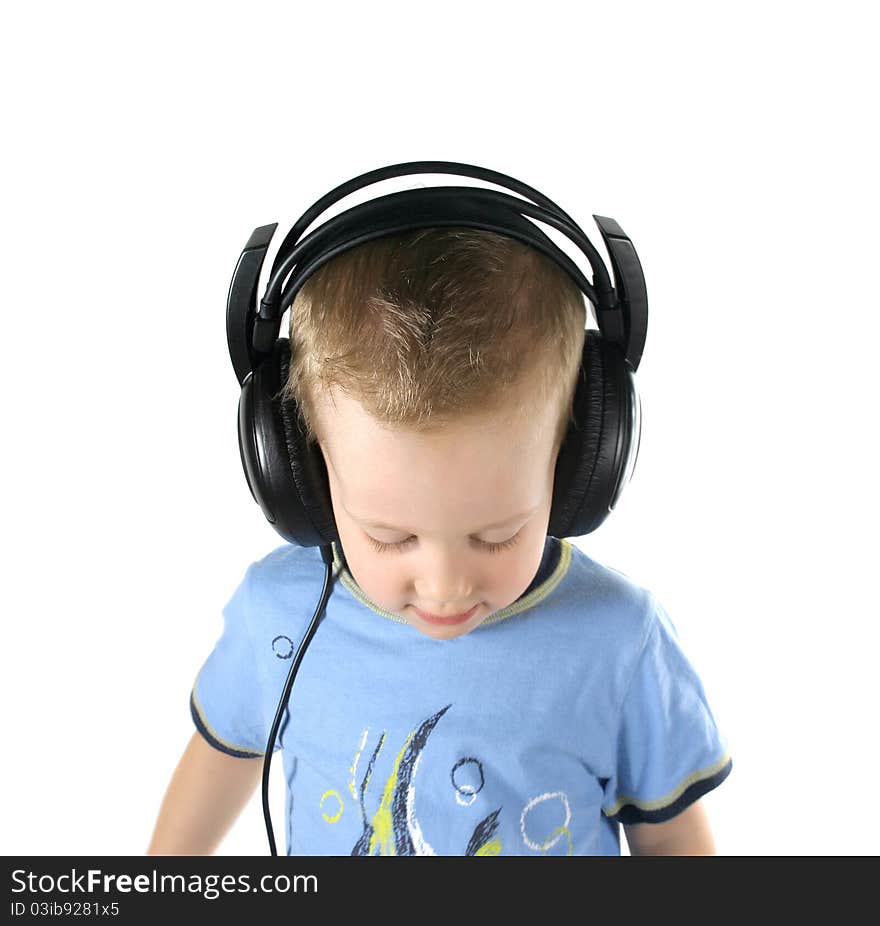 Little DJ boy looking down on a white background