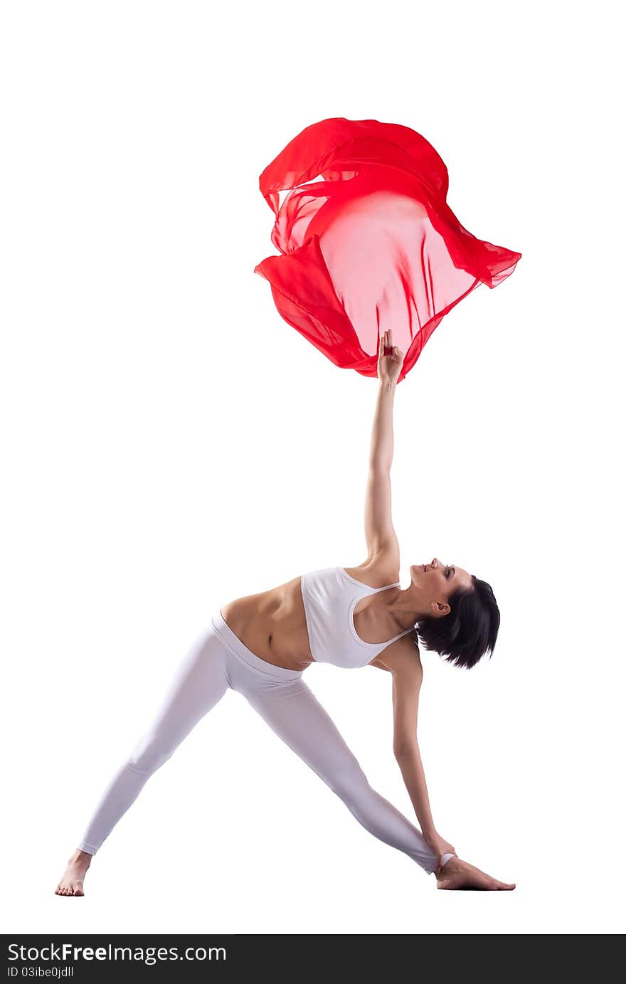 Woman Doing Yoga Pose And Red Flying Cloth In Air