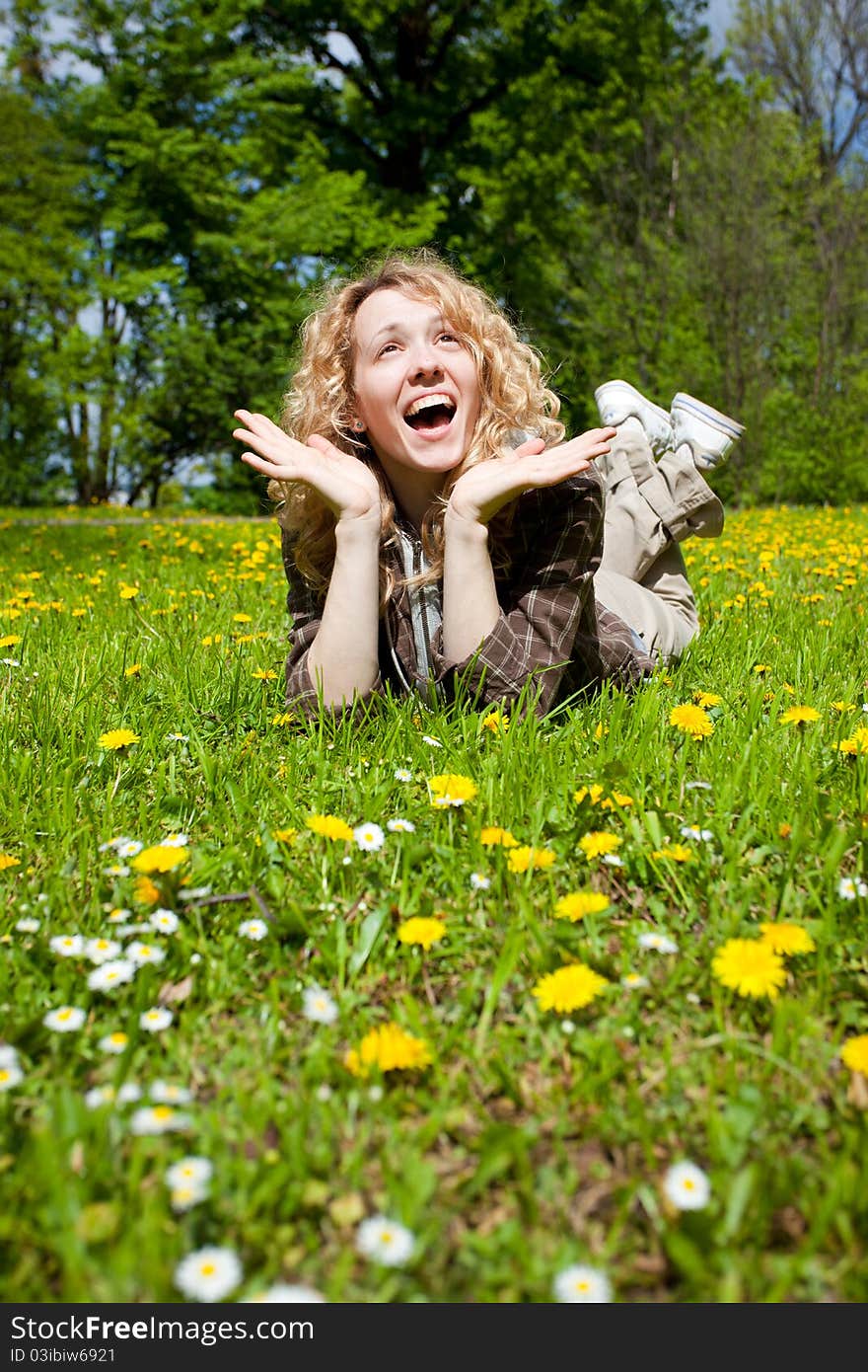 Happy Surprised Woman On Flower Field