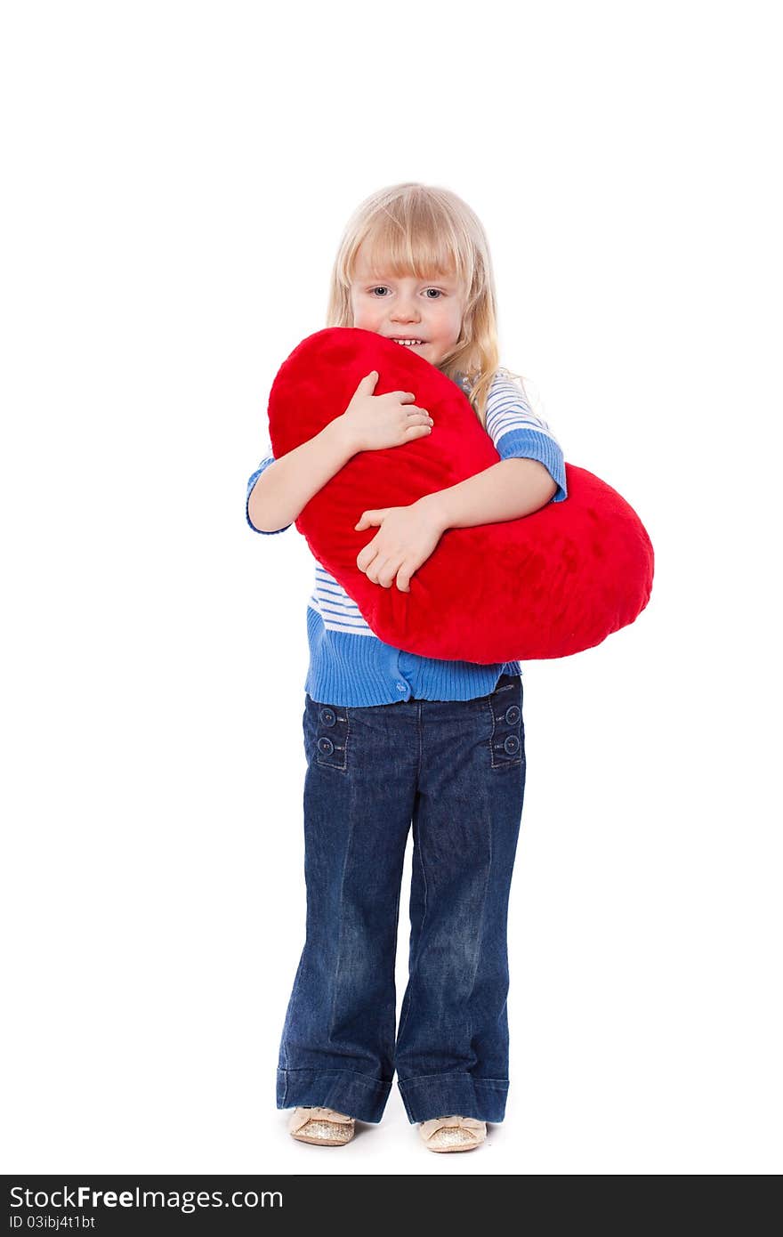 Little girl with red heart at hands, isolated