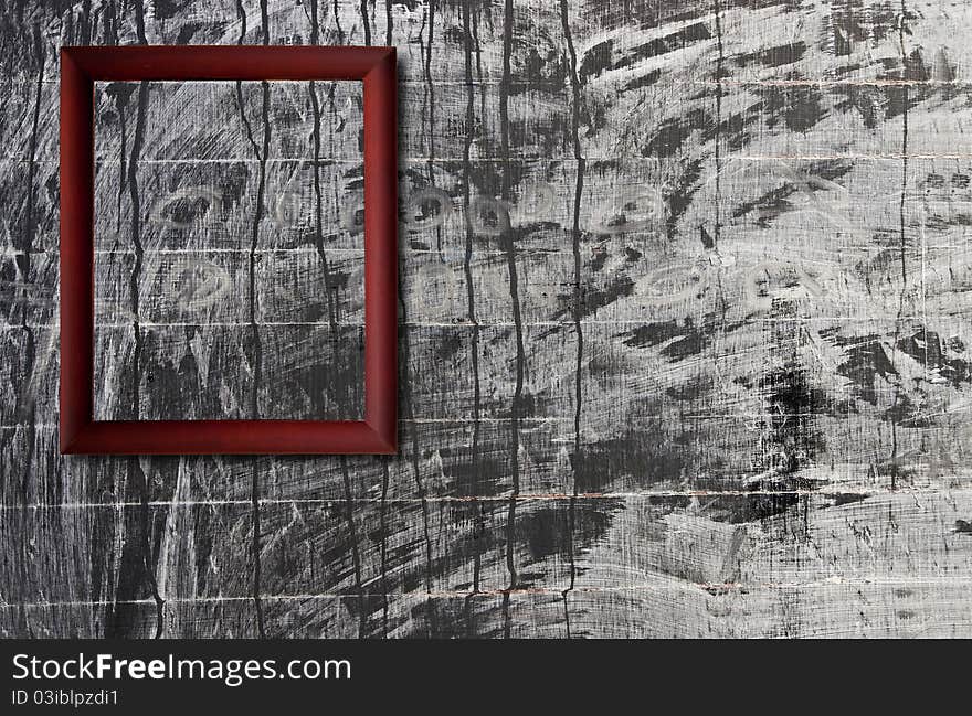 Wooden photo frame on grunge chalkboard background. Wooden photo frame on grunge chalkboard background