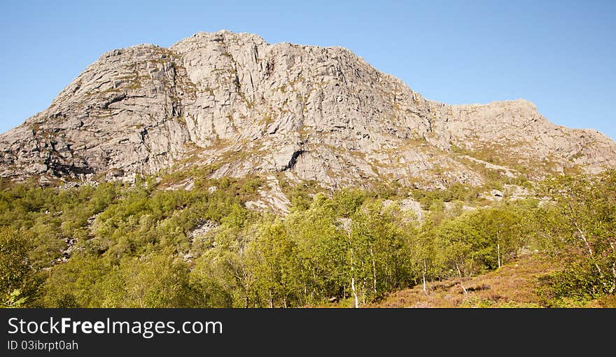 Wide angle view of mountain Bynuten in south Norway. Wide angle view of mountain Bynuten in south Norway