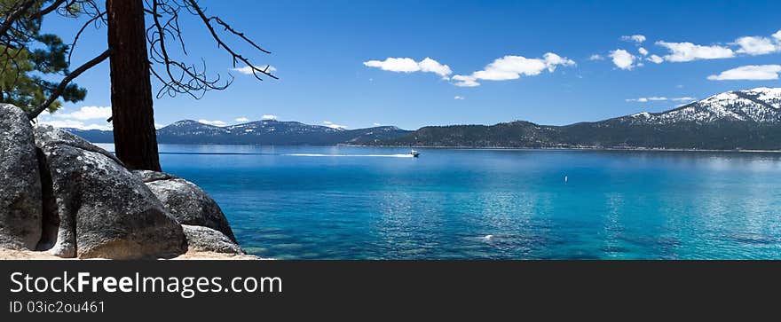 Lake Tahoe panorama with few clouds on sky